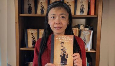 Calgary author Jacqueline Louie with her new book, Honouring the Gold Mountain Dreamers. (Photo courtesy Jacqueline Louie)