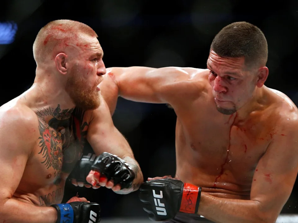 Conor McGregor (left) and Nate Diaz during their second meeting (Getty Images)