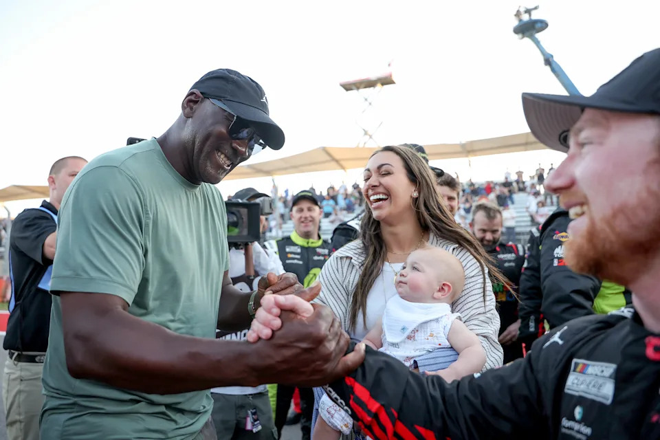 AUSTIN, TEXAS - MARCH 01: Michael Jordan, NBA Hall of Famer and co-owner of 23XI Racing celebrates with Tyler Reddick, driver of the #45 Chumba Casino Toyota, after winning his third race in a row to start the 2026 NASCAR season winning the NASCAR Cup Series DuraMax Grand Prix Powered by RelaDyne at Circuit of The Americas on March 01, 2026 in Austin, Texas. (Photo by James Gilbert/Getty Images)