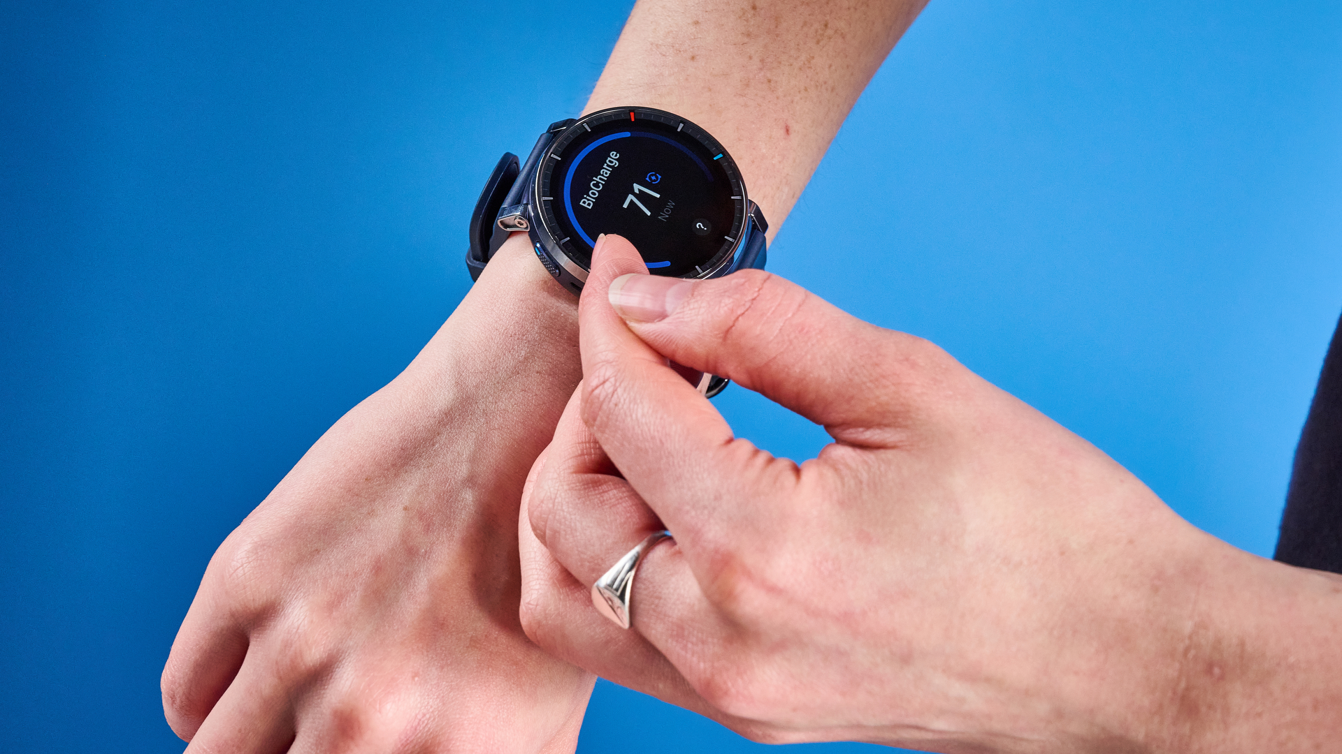 the amazfit active 3 premium photographed against the blue tom's guide background