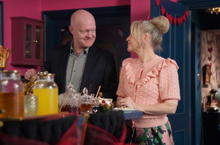 548946,TITLE:Eastenders Max and Linda smile at one another in Peacock Palace in a scene from EastEnders