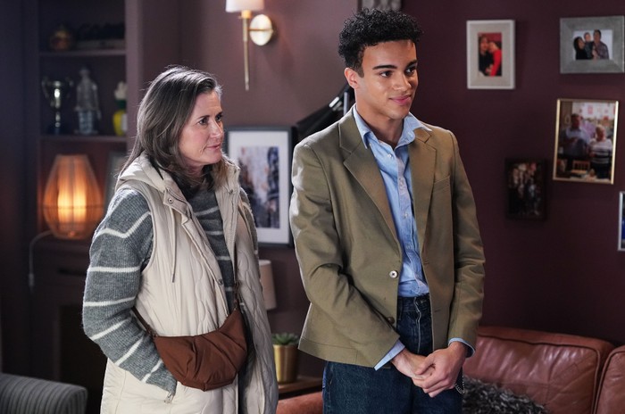 553667,TITLE:Eastenders Sandra stands beside Josh in a scene from EastEnders