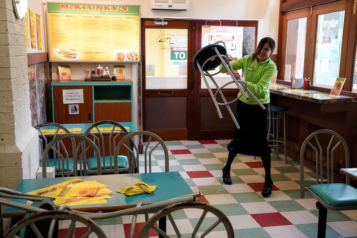 553671,TITLE:Eastenders Bea throws a chair across the room in frustration in McKlunkys in a scene from EastEnders