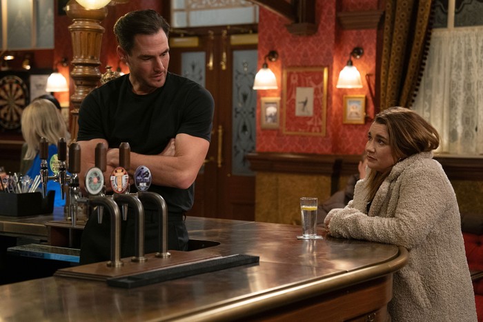 553689,TITLE:Eastenders Zack and Vicki chat in the pub in a scene from EastEnders