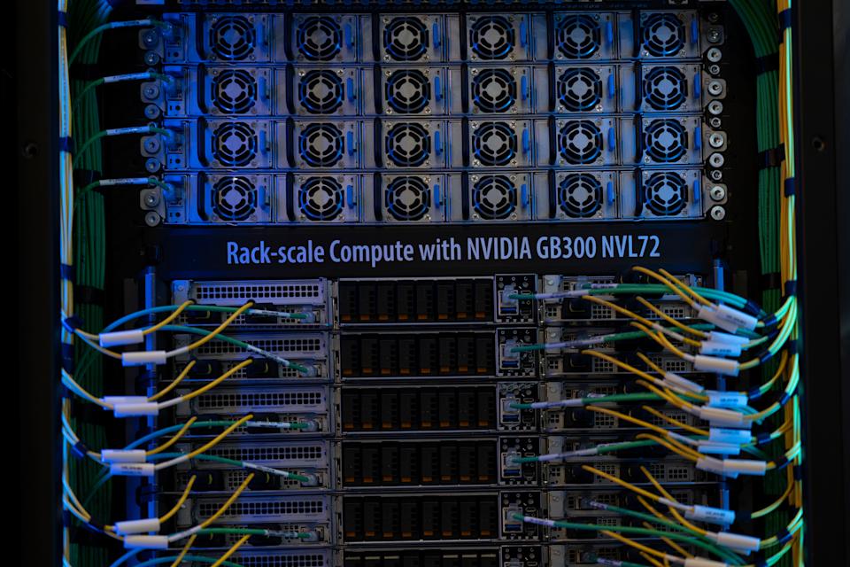 BARCELONA, SPAIN - MARCH 3: A rack-scale computer Nvidia GB300 for artificial intelligence is displayed at Supermicro booth during the second day of the Mobile World Congress 2026 at Fira Barcelona Gran Via on March 3, 2026 in Barcelona, Spain. Telecom and tech leaders are convening at the Mobile World Congress from March 2-5 to showcase the latest in 5G, 6G and AI-driven devices. The annual event highlights new connectivity innovations and technologies shaping the industry. (Photo by Javier Mostacero Carrera/Getty Images)