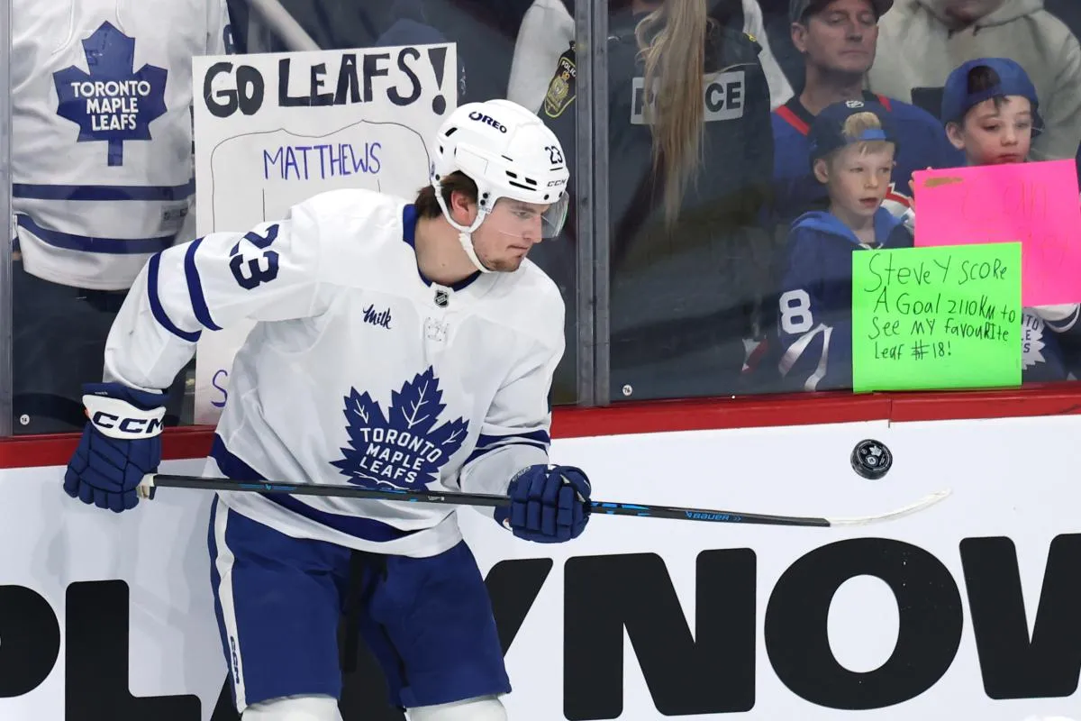 Toronto Maple Leafs left wing Matthew Knies (23) puck juggles before a game against the Winnipeg Jets at Canada Life Centre.