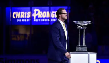 Former St. Louis Blues defenseman Chris Pronger (44) walks past The Presidents Cup Trophy after his jersey is retired and raised to the rafters prior to a game between the St. Louis Blues and the Nashville Predators at Enterprise Center.