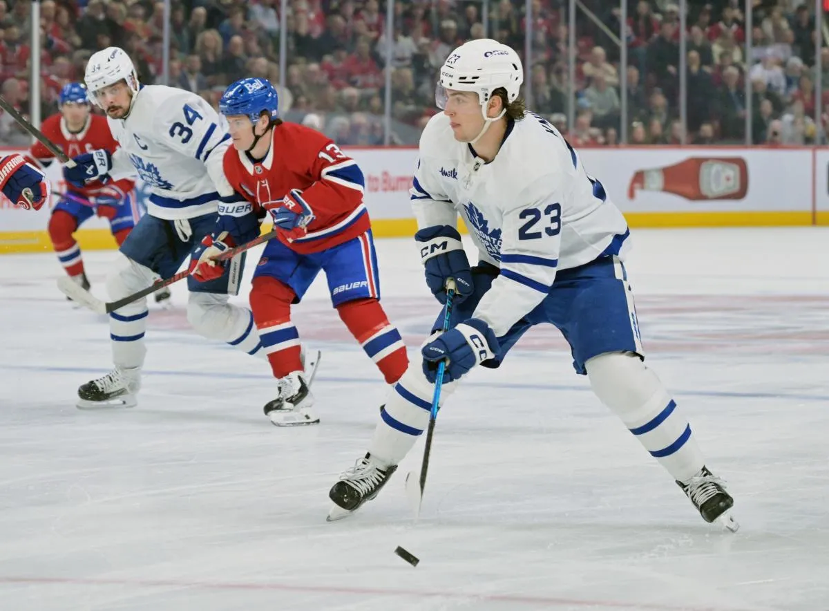 Toronto Maple Leafs forward Matthew Knies (23) plays the puck against the Montreal Canadiens during the first period at the Bell Centre.