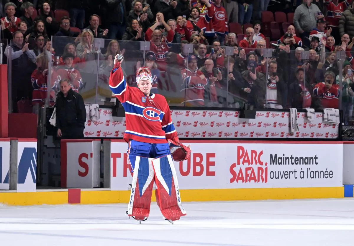 Montreal Canadiens goalie Jakub Dobes (75) celebrates a win against the Carolina Hurricanes at the Bell Centre.