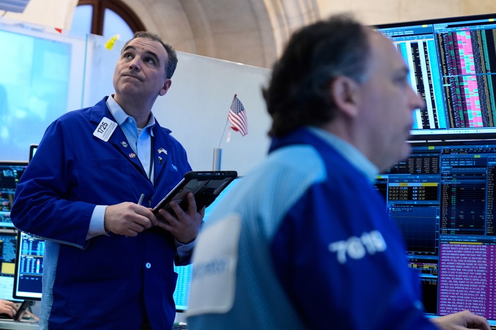 Christopher Lagana works on the floor at the New York Stock Exchange in New York, Tuesday, March 10, 2026. (AP Photo/Seth Wenig)