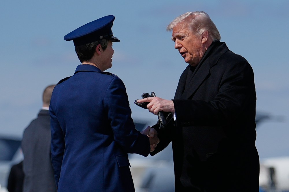 President Donald Trump greets Col. Matha