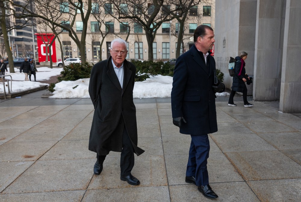 Frank Stronach, left, arrives at the 361 University Ave. courthouse in Toronto, on Tuesday, February 17, 2026. THE CANADIAN PRESS/Laura Proctor