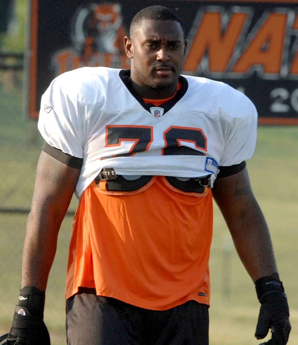 Cincinnati Bengals offensive tackle Levi Jones walk down the field.