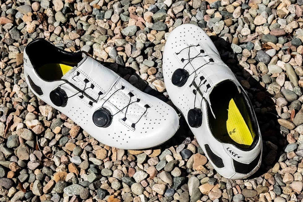 Lake Cycling shoes placed on gravel.