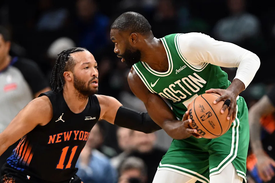 New York Knicks guard Jalen Brunson (11) defends Boston Celtics guard Jaylen Brown (7) during the first half at the TD Garden.