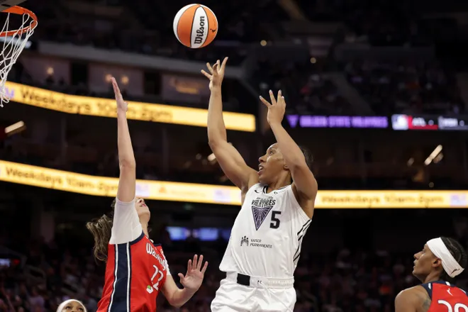 SAN FRANCISCO, CALIFORNIA - MAY 21: Kayla Thornton #5 of the Golden State Valkyries shoots over Sonia Citron #22 of the Washington Mystics during the second half at Chase Center on May 21, 2025 in San Francisco, California. (Photo by Ezra Shaw/Getty Images)