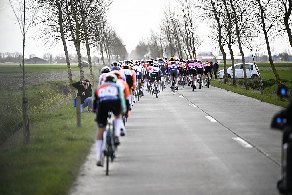 The pack of riders pictured in action at the Moeren during the men elite 'Middelkerke-Wevelgem - In Flanders Fields' one day cycling race, 240.8 km from Middelkerke to Wevelgem, on Sunday 29 March 2026. BELGA PHOTO JASPER JACOBS (Photo by JASPER JACOBS / BELGA MAG / Belga via AFP)