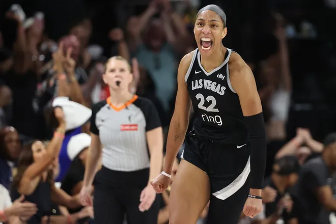LAS VEGAS, NEVADA - OCTOBER 03: A'ja Wilson #22 of the Las Vegas Aces celebrates after making a basket against the Phoenix Mercury in the fourth quarter of Game One of the 2025 WNBA Playoffs finals at Michelob ULTRA Arena on October 03, 2025 in Las Vegas, Nevada. (Photo by Ian Maule/Getty Images)