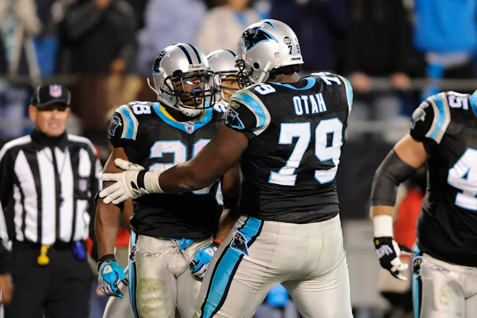Carolina Panthers running back Jonathan Stewart celebrates his second quarter touchdown with tackle Jeff Otah.