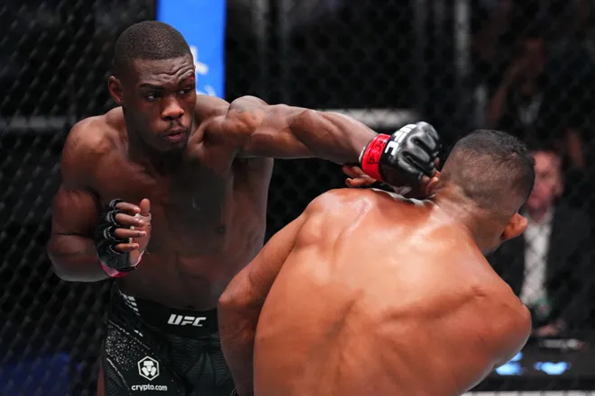 LAS VEGAS, NEVADA - MARCH 14: (L-R) Bolaji Oki of Belgium punches Manoel Sousa of Brazil in a lightweight fight during the UFC Fight Night event at Meta APEX on March 14, 2026 in Las Vegas, Nevada. (Photo by Chris Unger/Zuffa LLC)