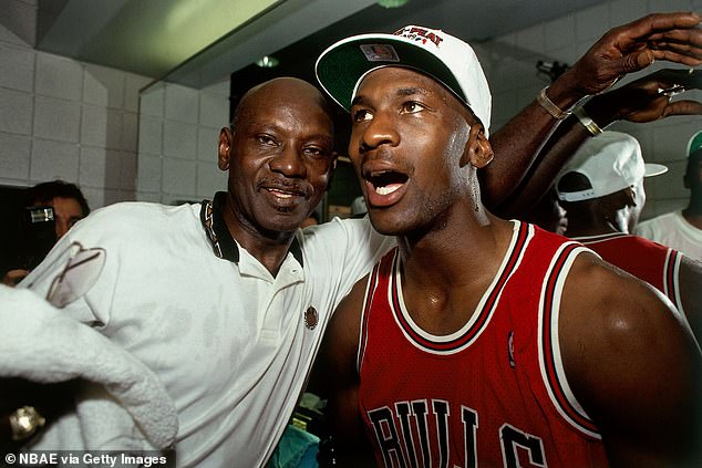 Jordan celebrates winning an NBA Championship alongside his father James in 1993