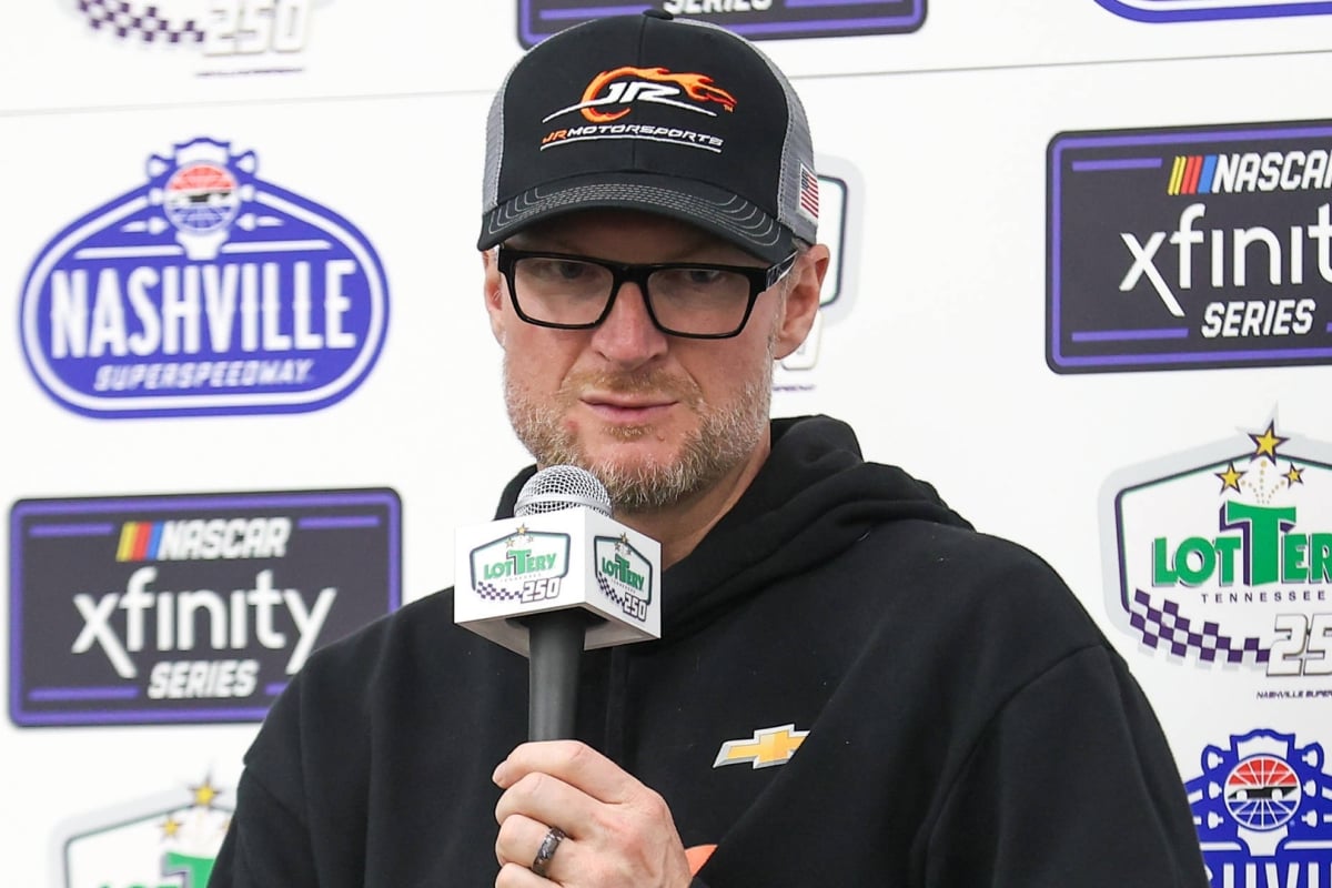 An image of NASCAR legend Dale Earnhardt Jr. addressing the media in a press conference