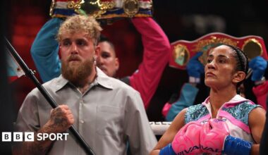 Jake Paul waves the Puerto Rico flag before Amanda Serrano's fight with Katie Taylor