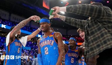 Shai Gilgeous-Alexander, of the Oklahoma City Thunder, gets drinks poured on him after the win against the Boston Celtics