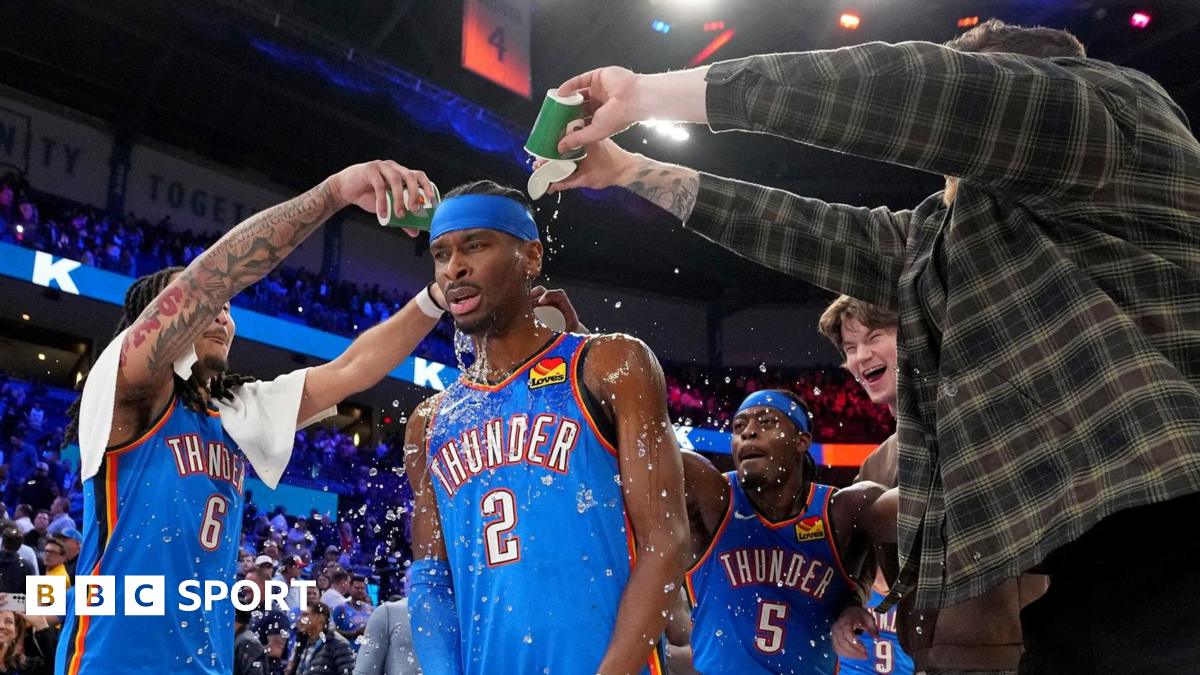 Shai Gilgeous-Alexander, of the Oklahoma City Thunder, gets drinks poured on him after the win against the Boston Celtics