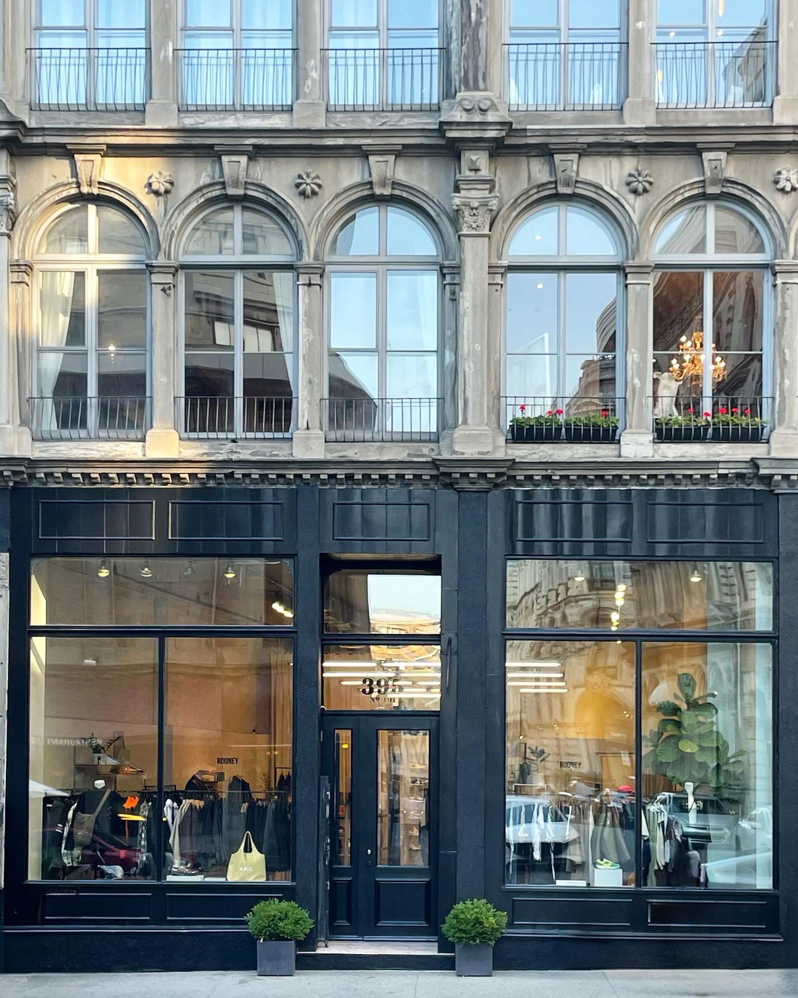 Image may contain Plant Urban Accessories Bag Handbag City Window Person and Shop