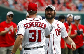 Washington Capitals' Alex Ovechkin (right) shares a laugh with Washington Nationals' Max Scherzer