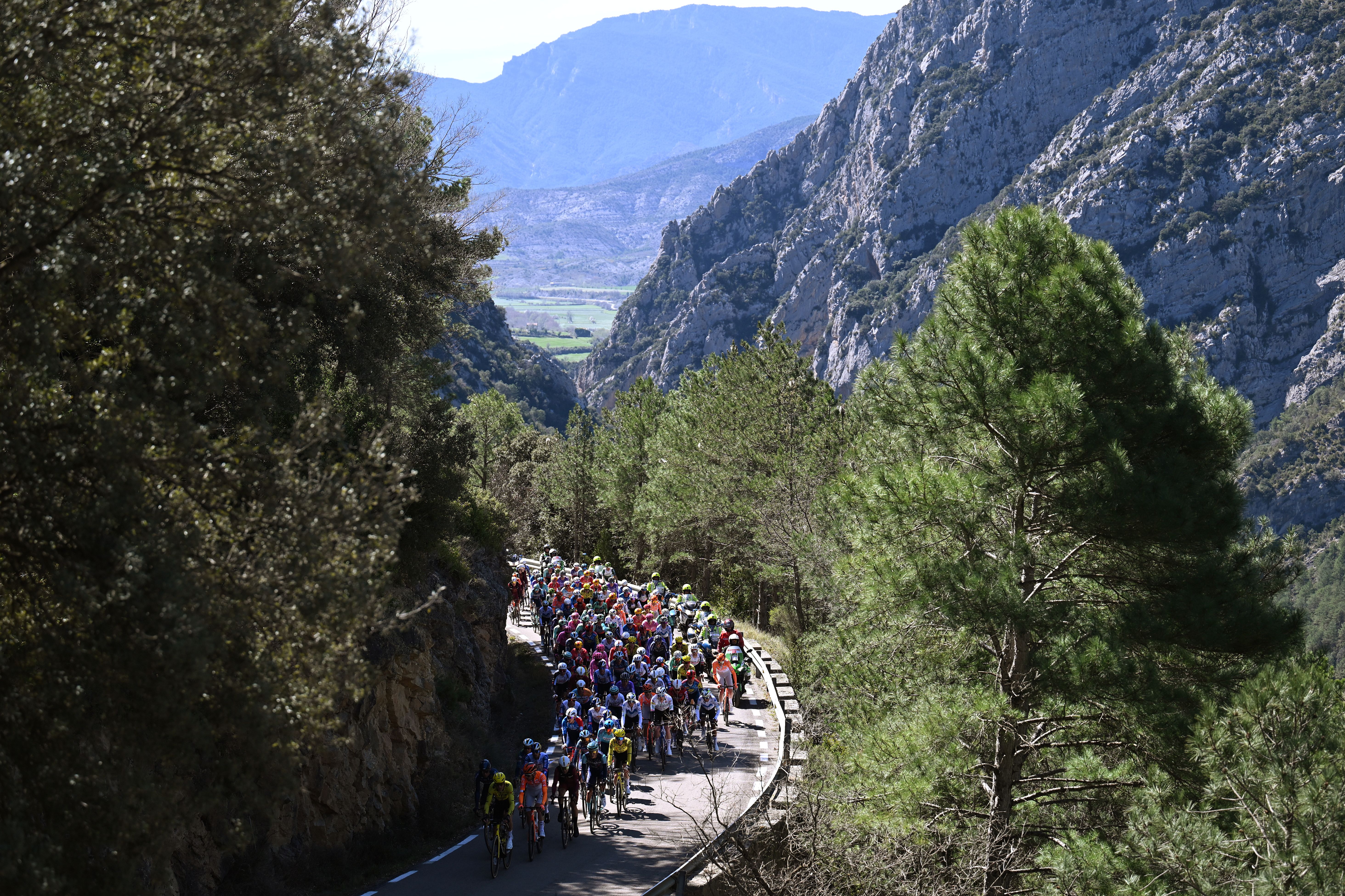 LA MOLINA, SPAIN - MARCH 27: A general view of the peloton passing through a landscape during the 105th Volta a Catalunya 2026, Stage 5 a 155.3km stage from La Seu d'Urgell to La Molina/Coll de Pal 2109m / #UCIWT / on March 27, 2026 in La Molina, Spain. (Photo by Szymon Gruchalski/Getty Images)
