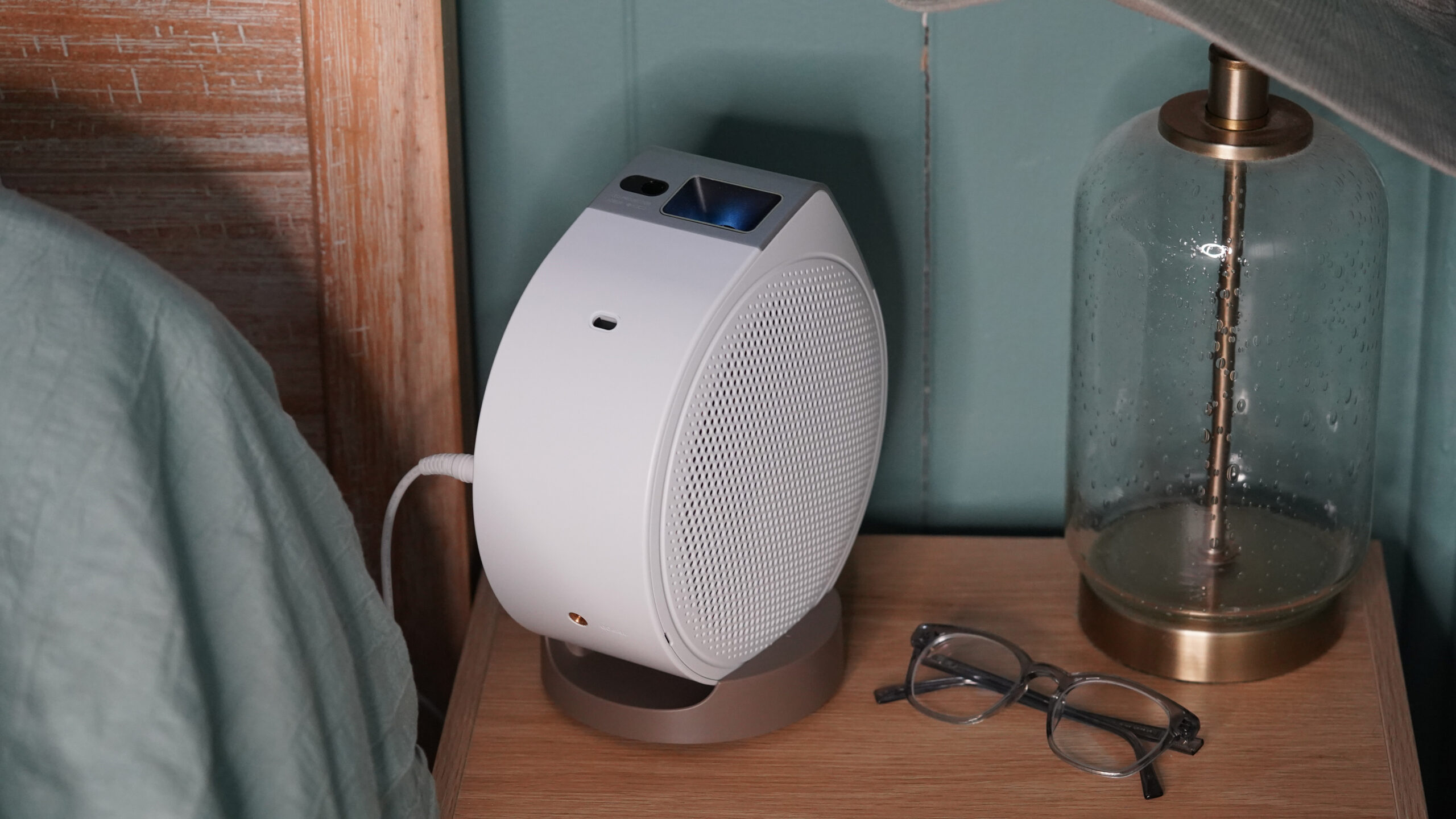 BenQ GV32 Bedside A BenQ GV32 rests on a user's nightstand.