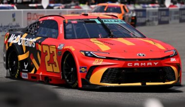 Michigan Wolverines basketball head coach Dusty May watches his team cut down the nets in Chicago. (Photo by Junfu Han / USA TODAY NETWORK via Imagn Images)