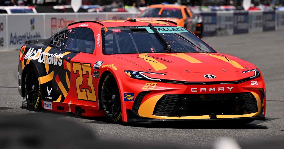 Michigan Wolverines basketball head coach Dusty May watches his team cut down the nets in Chicago. (Photo by Junfu Han / USA TODAY NETWORK via Imagn Images)