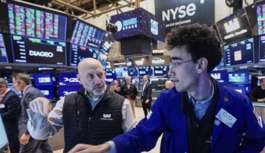 Dow drops 400 points after trimming an earlier plunge