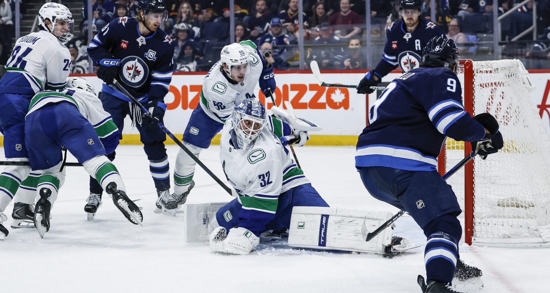 Morrissey scores in OT as Jets slip past Canucks 3-2