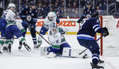 Morrissey scores in OT as Jets slip past Canucks 3-2