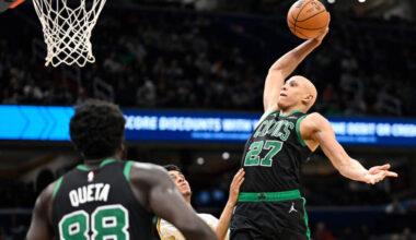 Jordan Walsh dunks during the second half of an NBA basketball game against the Washington Wizards Thursday, Dec. 4, 2025, in Washington. (John McDonnell/AP)