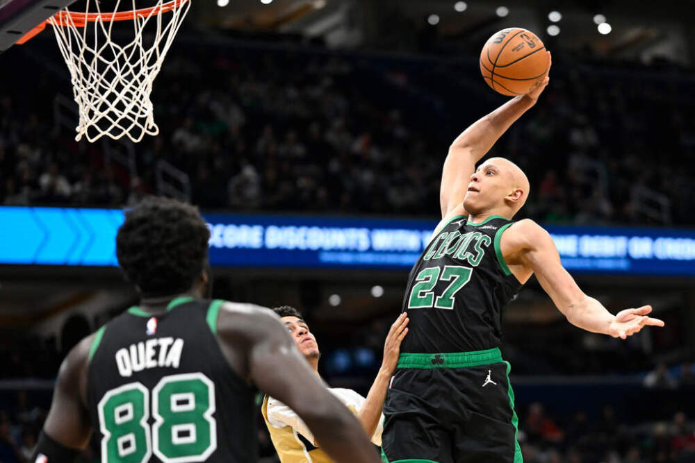 Jordan Walsh dunks during the second half of an NBA basketball game against the Washington Wizards Thursday, Dec. 4, 2025, in Washington. (John McDonnell/AP)