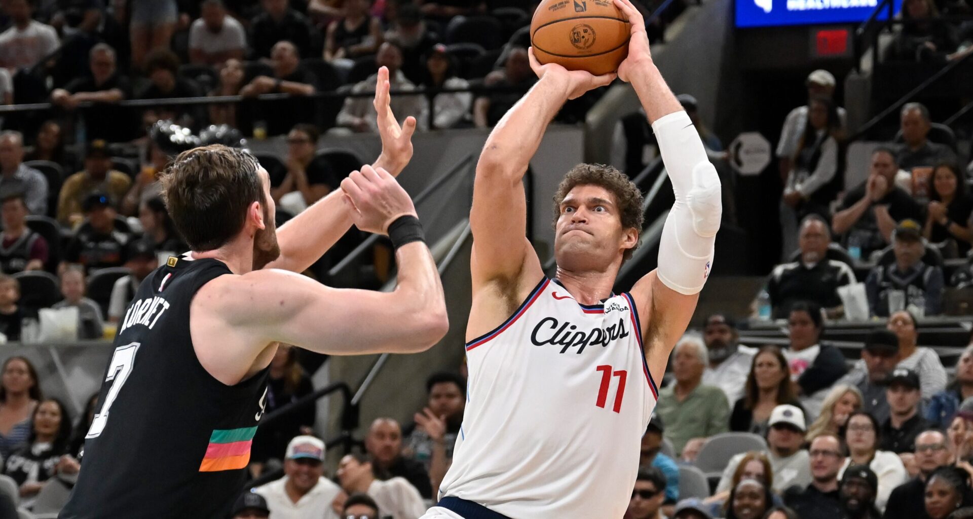 Brook Lopez shoots against Luke Kornet