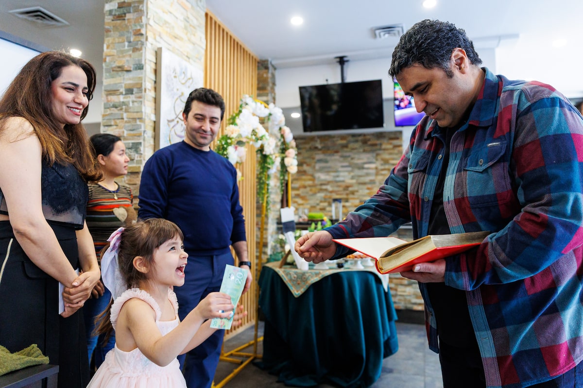 At Ottawa’s Cafe Tehran, Nowruz celebrations are weighed down by war in Iran