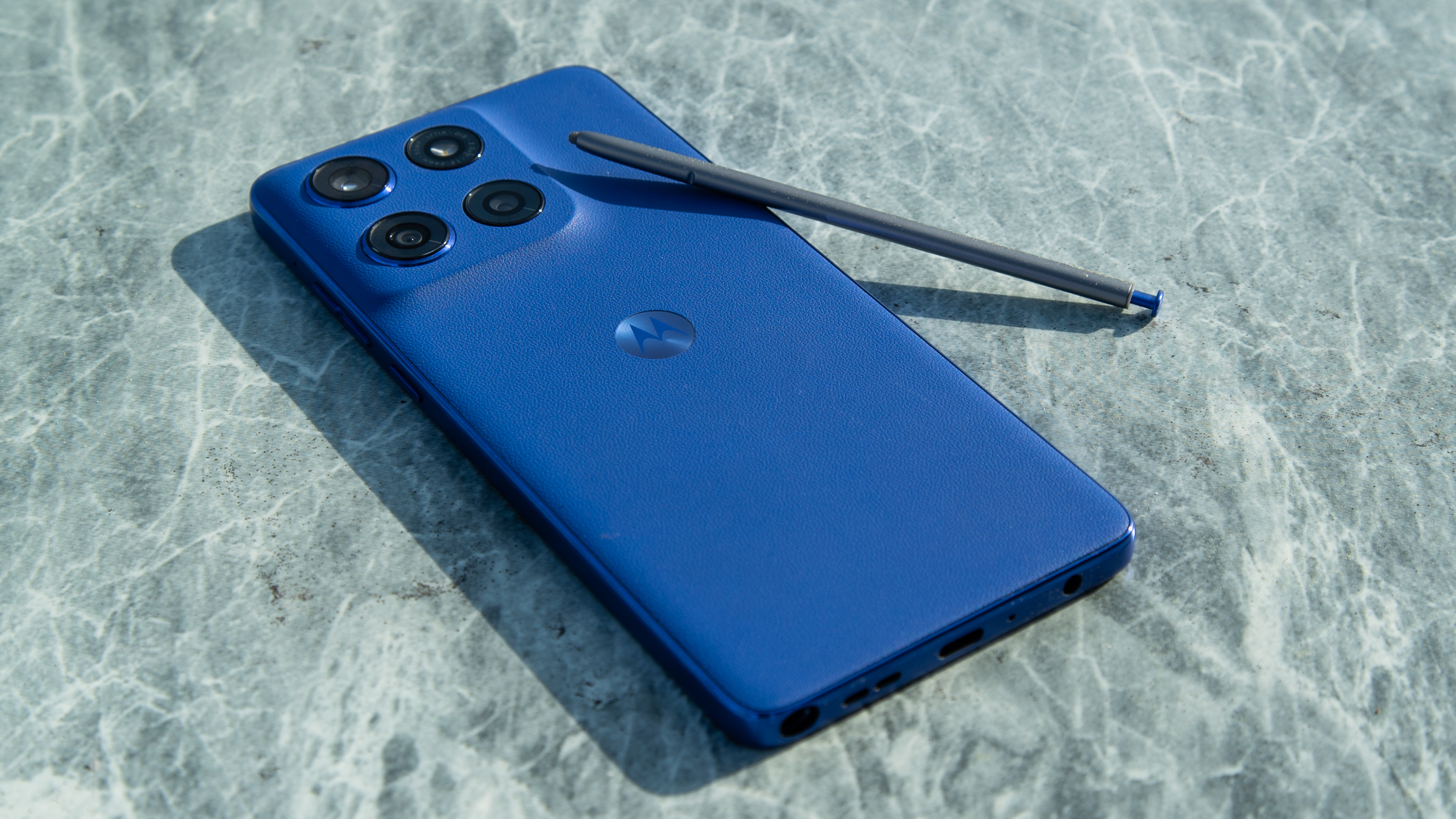 Moto G Stylus 2025 face down with the pen on top