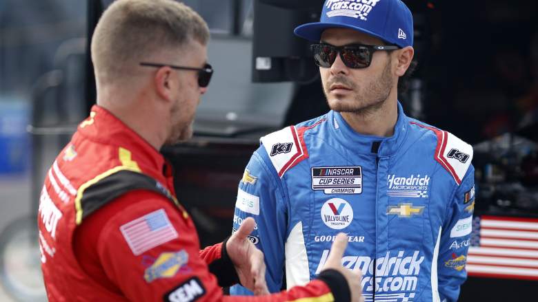 Kyle Larson and another NASCAR driver at Darlington Raceway discussing race strategy
