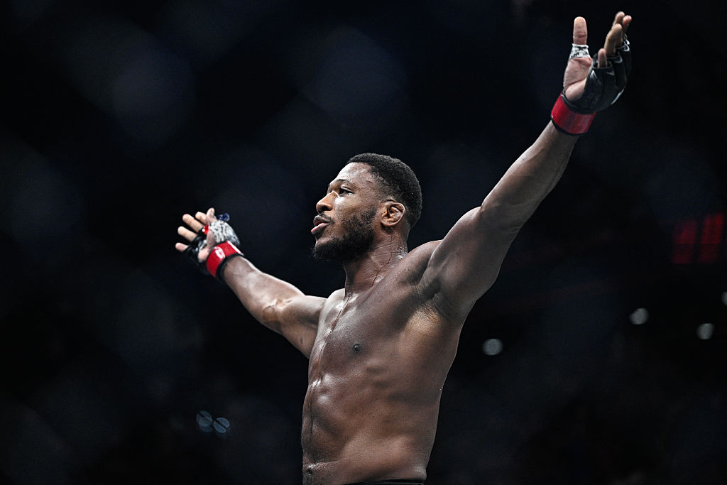 France's Oumar Sy celebrates after defeating Brazil's Brendson Ribeiro (unseen) during their mixed martial arts at the 4th edition of the Ultimate Fighting Championship (UFC) light heavyweight preliminary fights at the Bercy Accor Arena, in Paris, on September 6, 2025. (Photo by JULIEN DE ROSA / AFP via Getty Images)