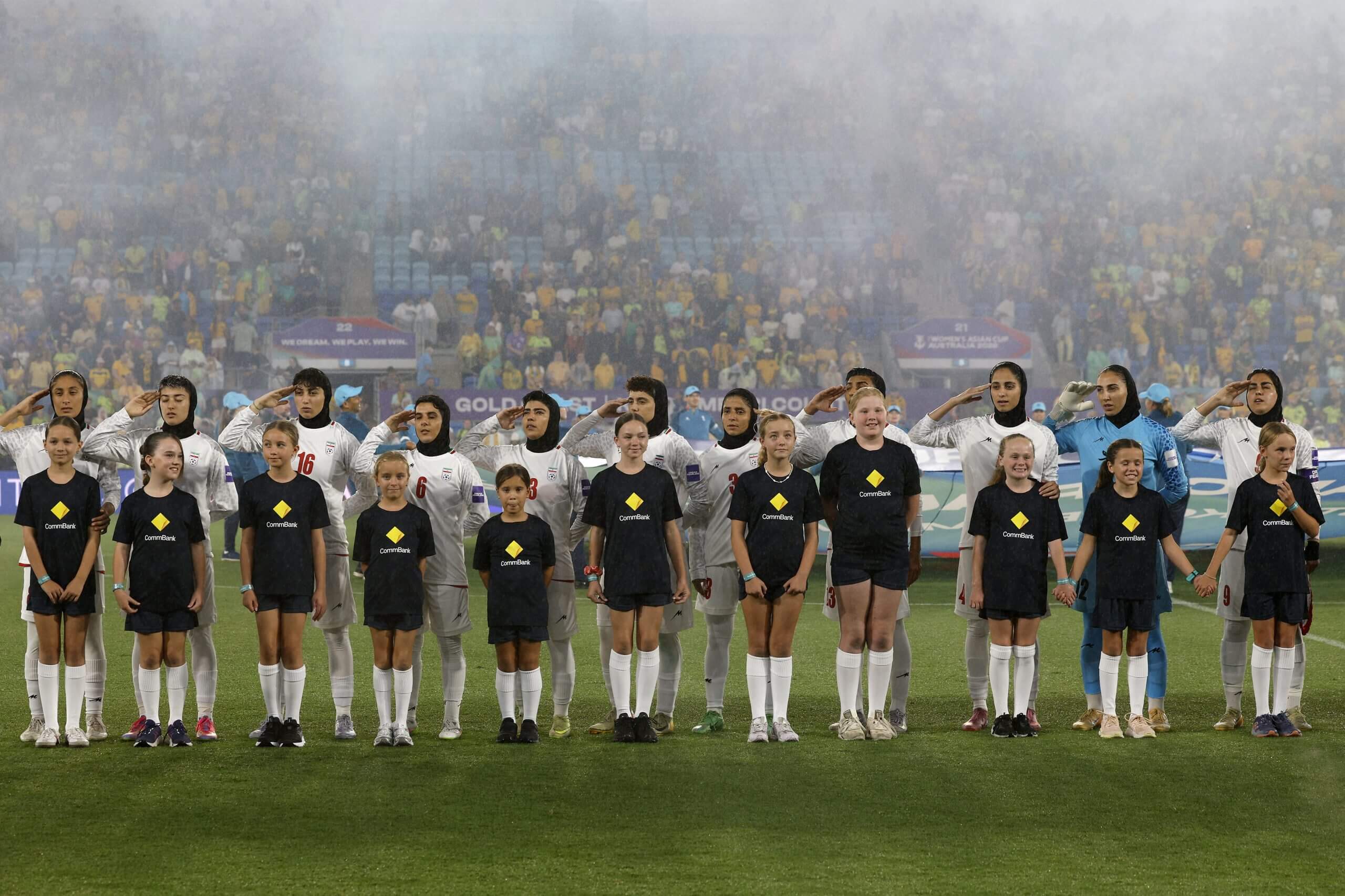 Iran player sang the anthem and saluted before facing Australia