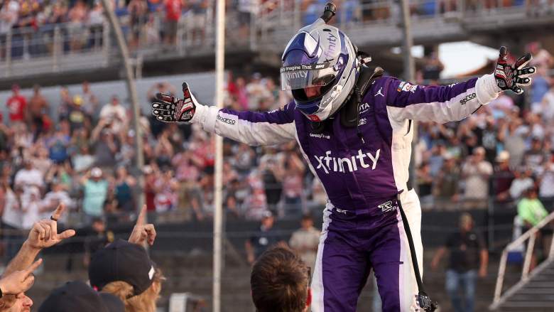 Tyler Reddick celebrates with trophy after Darlington NASCAR win