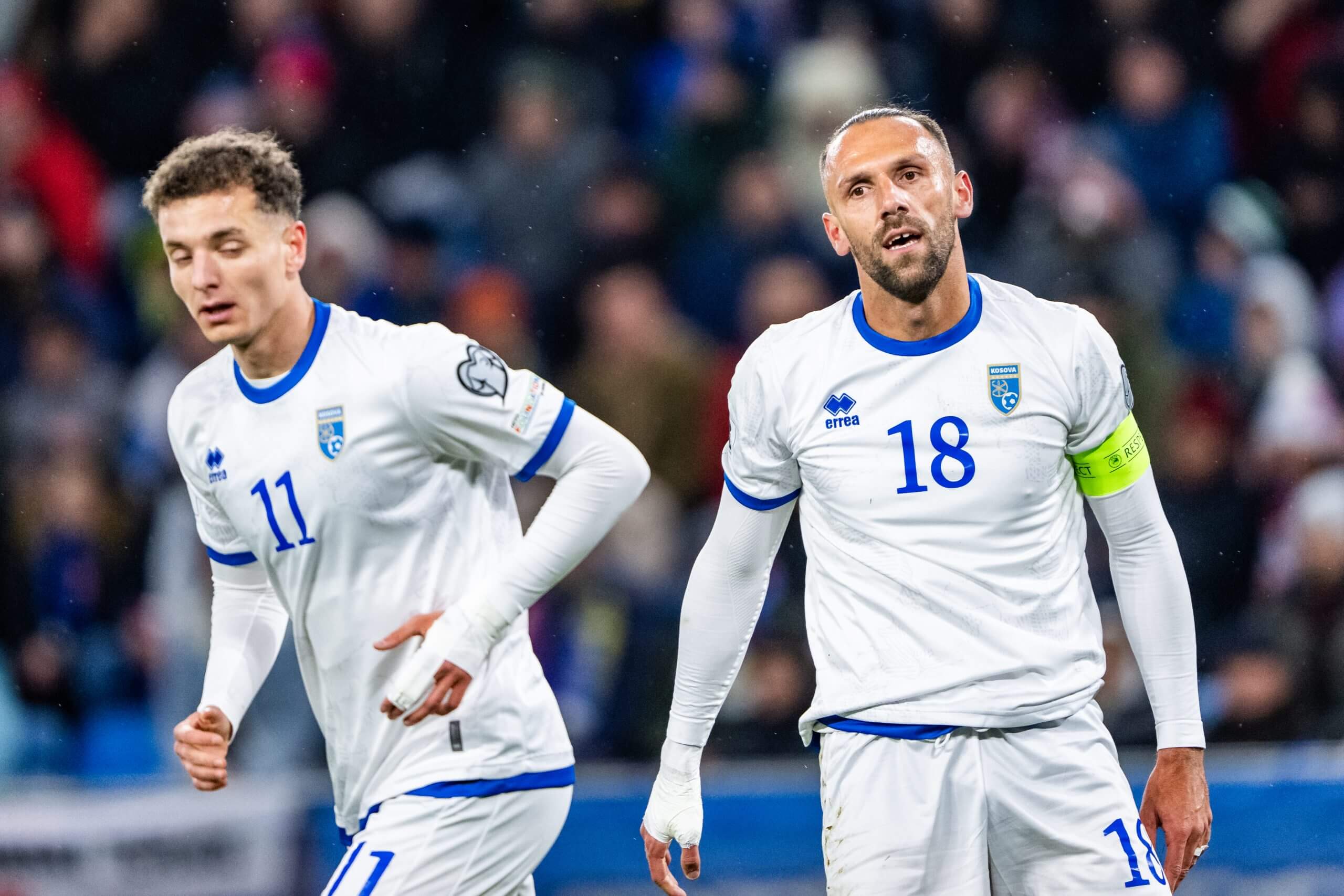 Fisnik Asllani and Vedat Muriqi playing for Kosovo