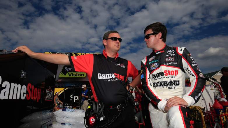 Chris Gabehart standing in NASCAR garage area during race weekend
