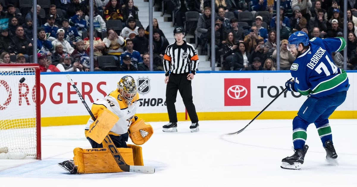 Jake DeBrusk's shootout goal leads Vancouver Canucks past Nashville Predators